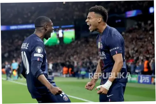 PSG Mengalahkan Liverpool di Liga Champions: Kvaratskhelia Memukau